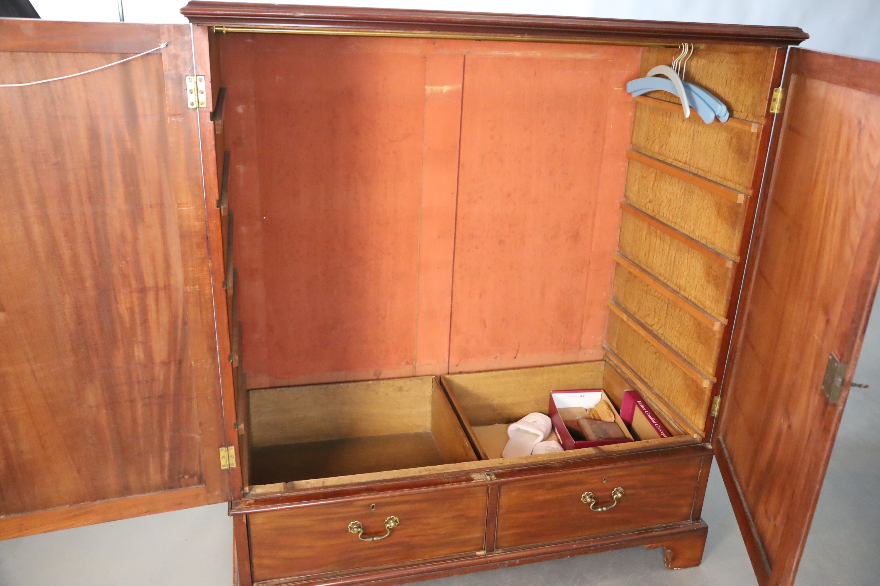 A George III mahogany press cupboard, W.127.5cm D.66cm H.145cm